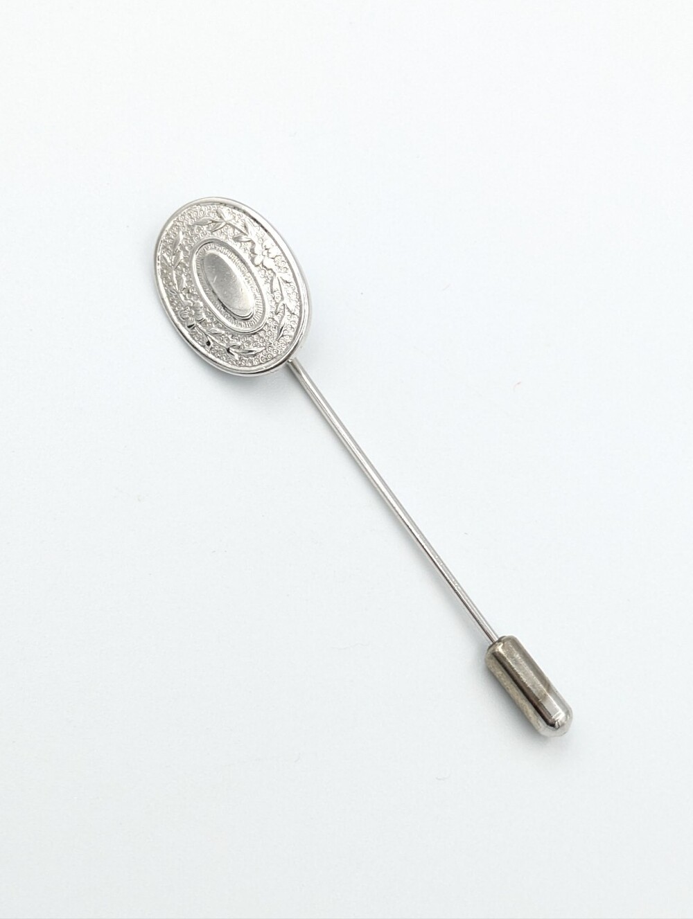 Vintage signed Sarah Coventry silver tone oval stick pin